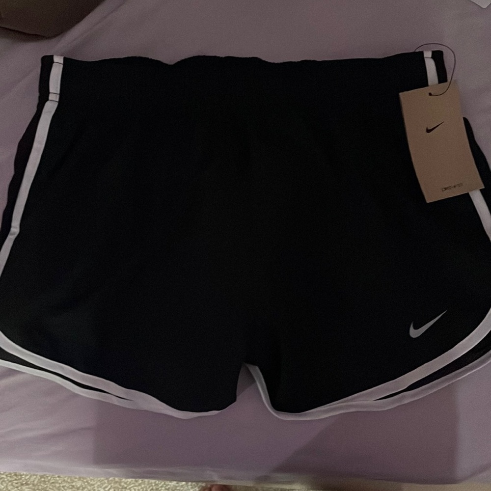 Tag still on Nike shorts